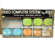 Load image into Gallery viewer, Close-up detail of Atari VCS 2600 console box corner.