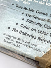 Load image into Gallery viewer, Atari game system box displaying brand logo and game title.
