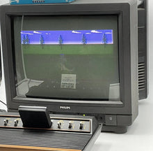 Load image into Gallery viewer, Atari VCS 2600 Woody console detail view of an old computer monitor with retro design.