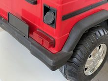 Load image into Gallery viewer, Close-up of the off-road Jeep details including tires and bumper.
