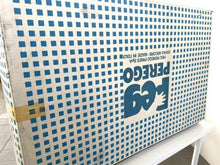 Load image into Gallery viewer, Side view of the packaging box with polka dot design and branding text.