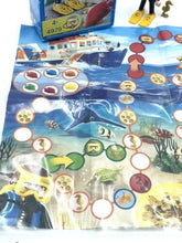 Load image into Gallery viewer, Detail shot of game pieces in red, green, blue, and orange leaf shapes.