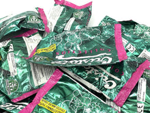Load image into Gallery viewer, GIOCHI PREZIOSI CRISTALL COLLECTION Fantasy PACK detail view highlighting various packages in green and pink.