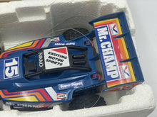 Load image into Gallery viewer, Detail of blue race car with number 15, racing stripes, and large spoiler.