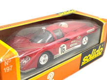 Load image into Gallery viewer, VINTAGE SOLIDO 197 Ferrari 512 Sandeman packaging view showcasing the red toy car with orange and white accents.