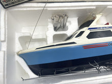 Load image into Gallery viewer, Detail view of the Vintage Nikko Caribic Star Speed Cruiser model showcasing its detailed hull.