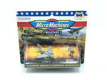 Load image into Gallery viewer, Packaging view of the Galoob MICRO MACHINES F 86 Sabre Jet with blue, orange, and yellow colors.