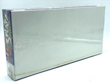 Load image into Gallery viewer, Packaging shot of the Splat! board game in a smooth silver box.