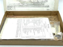 Load image into Gallery viewer, Carta Augusto model ship kit contents with an instruction sheet and various parts.