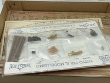 Load image into Gallery viewer, Carta Augusto packaging with various small items in plastic packaging and a label.