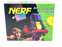 Load image into Gallery viewer, Nerf Slingshot 1991 Kenner packaging view featuring colorful graphics and game instructions.