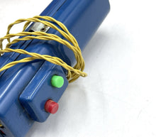 Load image into Gallery viewer, Close-up of a blue toy device with buttons and an attached cord.
