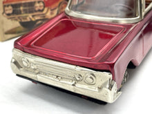 Load image into Gallery viewer, Close-up of the red toy police car with a light on top.