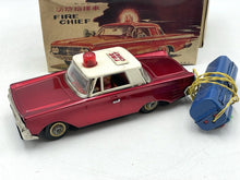 Load image into Gallery viewer, Front detail of the red toy car showcasing the chrome bumper.
