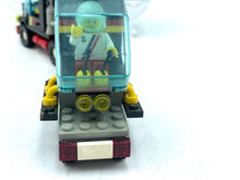 Load image into Gallery viewer, Front view of the red LEGO helicopter featuring a pilot figure and detailed design.