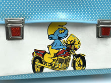 Load image into Gallery viewer, Smurfs Official close-up detail of the blue cartoon school bag featuring a metal clasp.