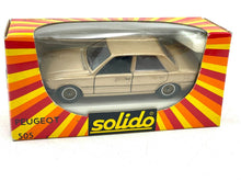 Load image into Gallery viewer, VINTAGE SOLIDO 1312 Peugeot 505 1/43 NEW OLD STOCK packaging with transparent display and branded design.