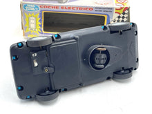 Load image into Gallery viewer, JUGUETES ROMAN COCHE ELECTRICO POLICE CAR rear view with detailed wheels and packaging visible.