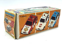 Load image into Gallery viewer, JUGUETES ROMAN COCHE ELECTRICO POLICE CAR side packaging view with multiple car images in brown and orange.