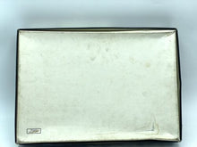 Load image into Gallery viewer, VINTAGE TELEQUIZ metallic surface close-up showing smooth texture and reflective quality.