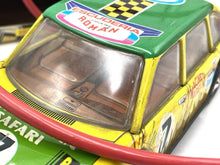 Carica l'immagine nel visualizzatore di Gallery, Juguetes Roman Coche Electrico Citroen Africa close-up of front with transparent windshield and racing stickers.