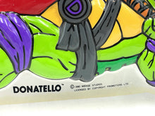 Load image into Gallery viewer, Lifestyle shot of Donatello on motorcycle in an action pose.