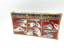 Load image into Gallery viewer, Close-up view of Atlantic Civil War toy cannons with assembly instructions