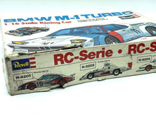 Load image into Gallery viewer, Top-down view of Revell BMW M1 Turbo RC car highlighting aerodynamic features.
