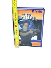 Load image into Gallery viewer, Close-up of the Tomb Raider diary cover showing the official logo.