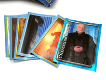 Load image into Gallery viewer, Detail view of various Star Wars trading cards featuring characters.