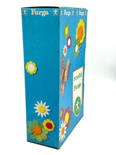 Load image into Gallery viewer, Side view of the 1968 Furga Tino Ride doll box featuring flower patterns.