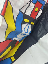 Load image into Gallery viewer, Detail of colorful fabric design featuring red, white, blue, and black on the Danguard Ace