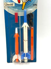Load image into Gallery viewer, Close-up of the instruction sheet for Quercetti Hercules and Orion missile toys with vintage graphics.