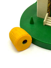 Load image into Gallery viewer, Detail close-up of the yellow cylindrical roll from the toy set