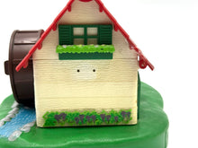 Load image into Gallery viewer, Detail view of the toy house featuring the water wheel and roof