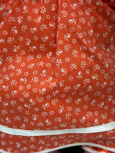 Load image into Gallery viewer, Detail of Fiba Chou Chou Rosebonbon Magnum doll's dress with polka dots and ruffled hem.