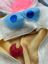 Load image into Gallery viewer, Close-up detail of rabbit costume headpiece showing colorful eyes and tongue