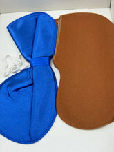 Load image into Gallery viewer, Detail view of blue and brown fabric pieces from the Pinocchio costume
