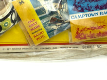 Load image into Gallery viewer, Detail of various packaging items with colorful graphics and text labels
