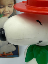 Load image into Gallery viewer, Side detail of Stack-up Snoopy showing collar and green scarf.