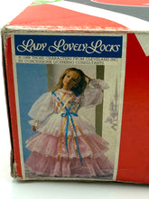 Carica l'immagine nel visualizzatore di Gallery, Side view of Lady Lovely Locks costume box with illustration and text label.
