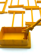 Carica l'immagine nel visualizzatore di Gallery, Mattel Sunshine Family Farm detail close-up of yellow painting tools including a paint tray and brush holder.