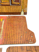 Carica l'immagine nel visualizzatore di Gallery, Close-up of barn detail in the Sunshine Family Farm playset featuring wood texture