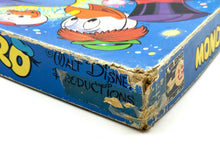 Carica l'immagine nel visualizzatore di Gallery, Close-up detail of the worn corner with colorful patterns on the box
