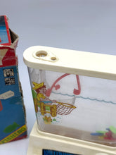 Load image into Gallery viewer, Detail of the fishing scene showing colorful fish and fishing net