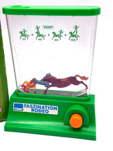 Load image into Gallery viewer, Vintage Rompin Cowboy Tomy Water Game toy, 1980 Rodeo edition detail close-up.