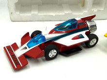 Load image into Gallery viewer, Front view of race car toy with aerodynamic design and large rear wing.