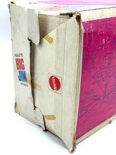Load image into Gallery viewer, Side view of the camper box with a damaged corner and graphic print