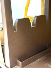Load image into Gallery viewer, Detail view of the wooden structure with cut-out shapes and smooth finish in the Mattel Big Jim Sports Camper.