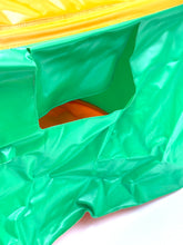 Load image into Gallery viewer, Mattel Big Jim Camping Tent detail close-up of green and orange fabric with wrinkled texture